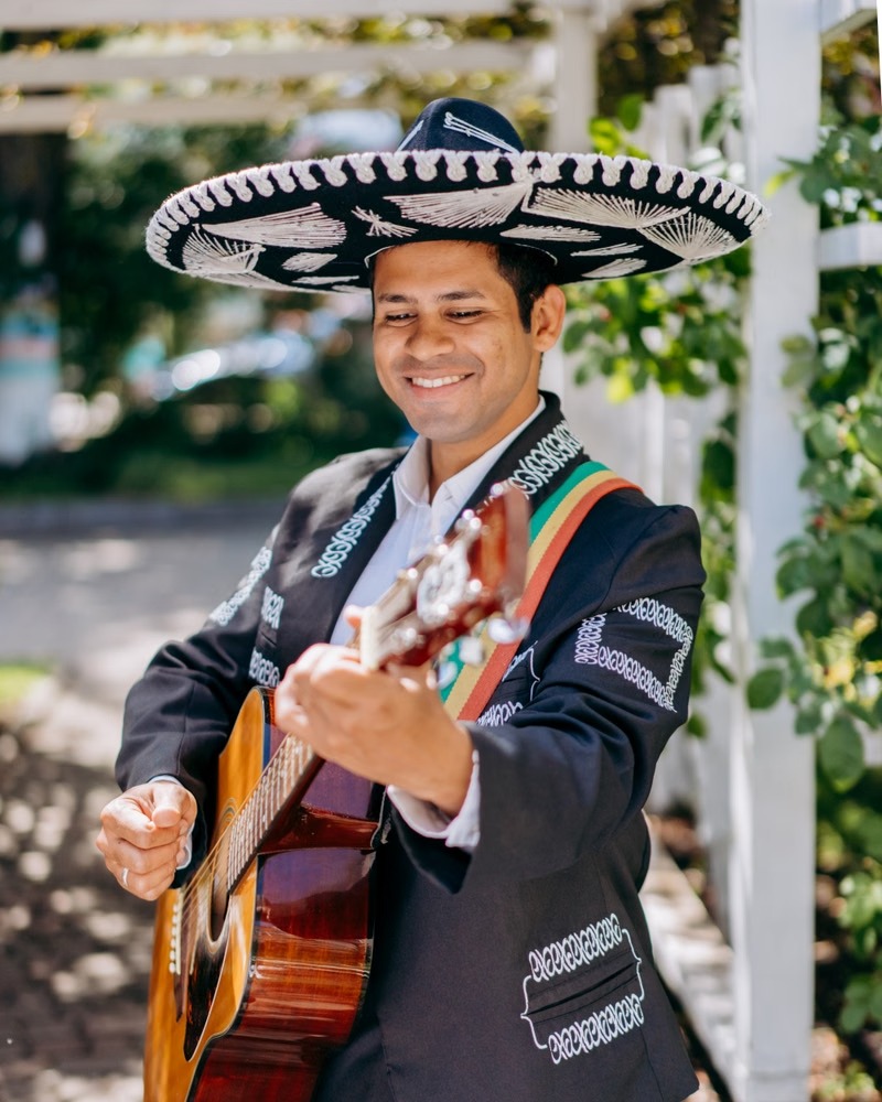 A mariachi band playing in the square.
